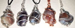 Botswana Agate wire wrapped pendants, Necklaces, Botswana Agates are usually shades of brown and grey with swirls of other colors. They very widely in design, and often have sprirals of color