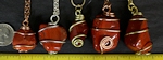 Red Jaspers are opaque, red stones. Red Jasper Stone wire wrapped pendants on necklaces.